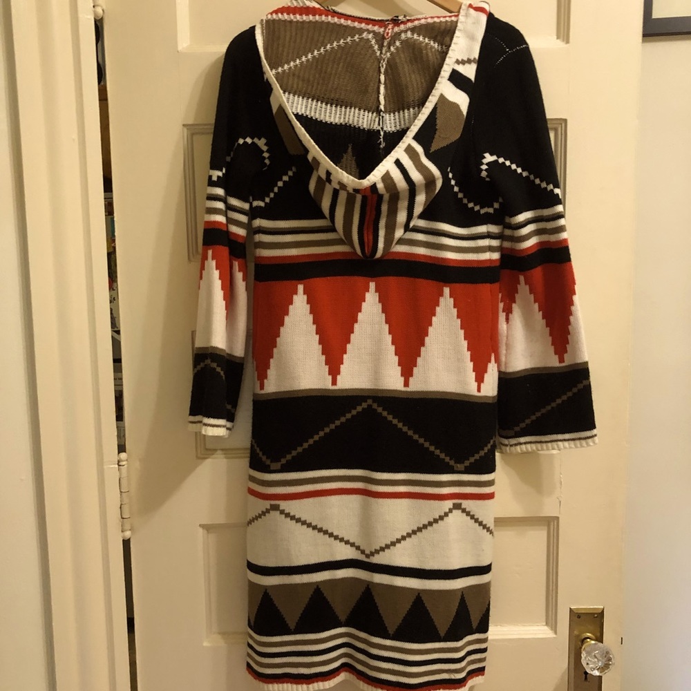 Knit tribal patterned sweater.